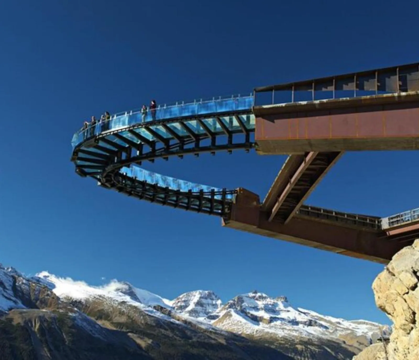 The Columbia Icefield Skywalk from below, its glass loop projecting into open air above the valley